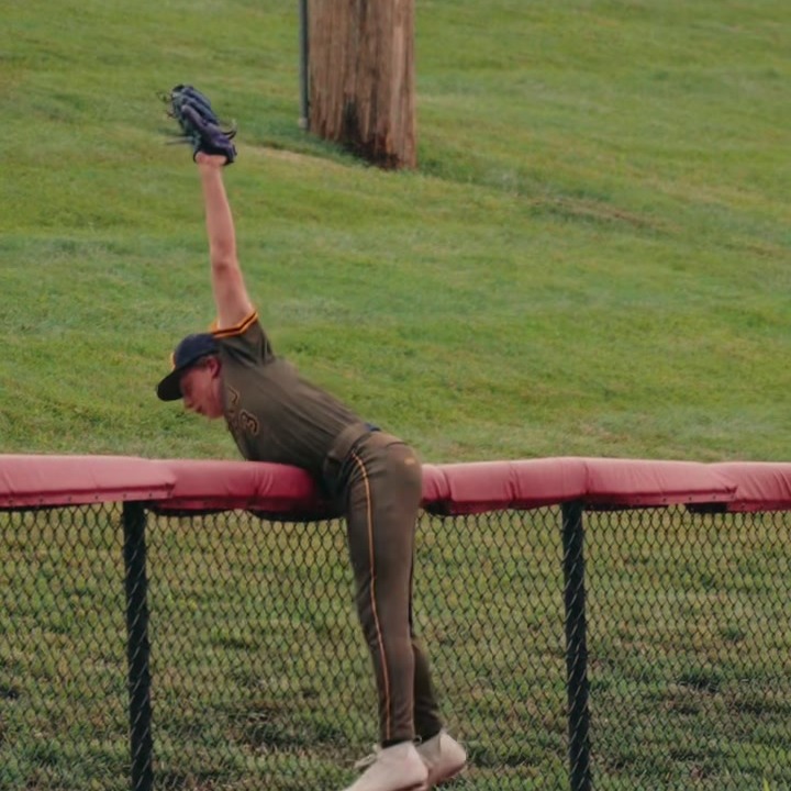 Breyer Beal making an over-the-fence catch